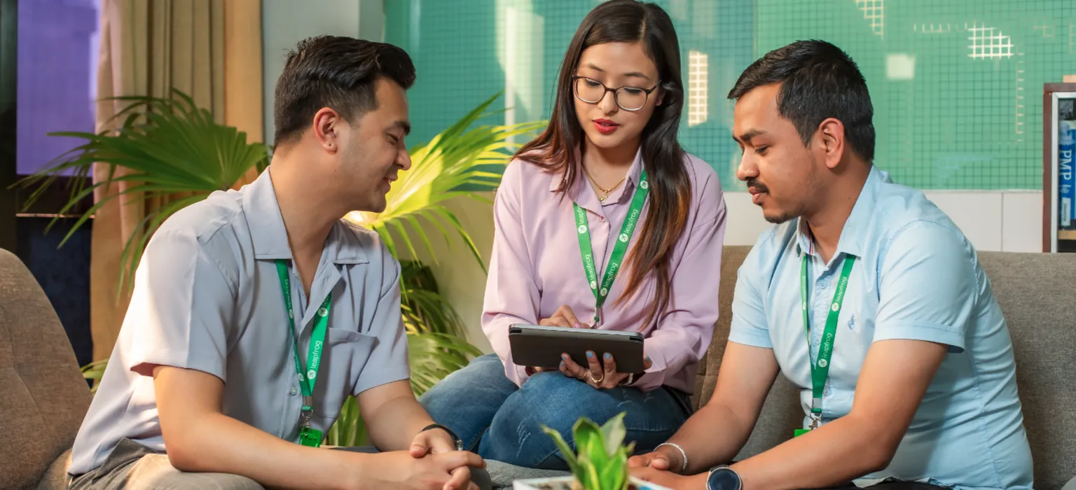 Three employees working together